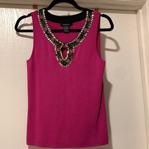 Fuchsia colored top with embellished neckline
